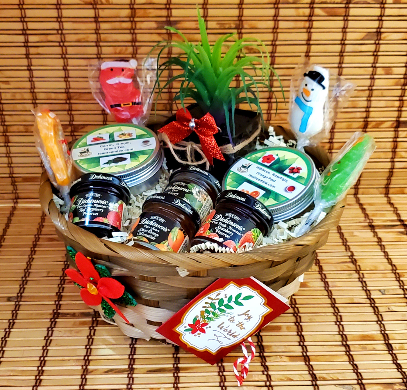 Herbal tea box with honey, strawberry jam and lollipops. Christmas hostess gift