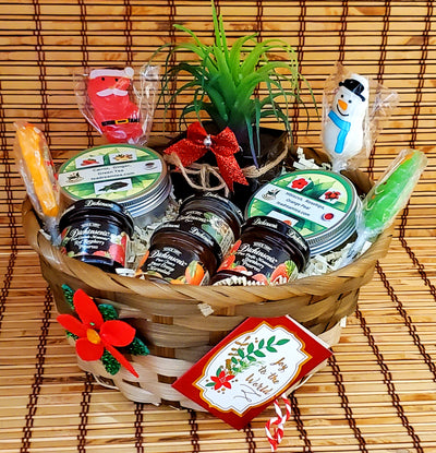 Herbal tea box with honey, strawberry jam and lollipops. Christmas hostess gift